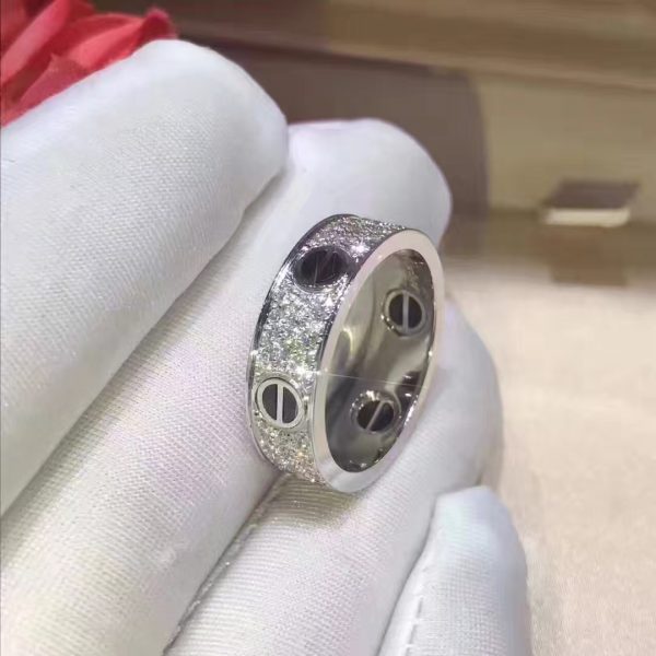 Cartier Love ring, 18K white gold, black ceramic, set with 66 brilliant-cut diamonds totaling 0.74 carats. Width: 6.5mm. Material: Pure 18K Yellow/Pink/White Gold Colors: Yellow Gold, Pink Gold, White Gold