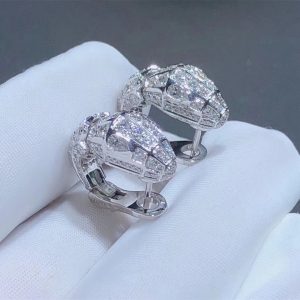 Bvlgari Serpenti 18 kt white gold earrings set with pavé diamonds (3.22ct) and two diamonds eyes. (0.51ct)