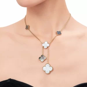 Van Cleef & Arpels Magic Alhambra necklace, 6 motifs, yellow gold, white and gray mother-of-pearl, onyx.